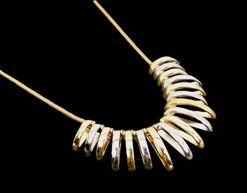 Silver and gold necklace designed with dome shape metal links attached to a snake chain. Two tone fashion necklace.