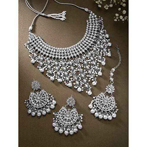 Aheli Elegant Indian Wedding Wear Faux Kundan Studded Choker Necklace with Maang Tikka Set Ethnic Fashion Jewelry for Women Maroon Kundan & Pearl Drop - color: Rhodium White