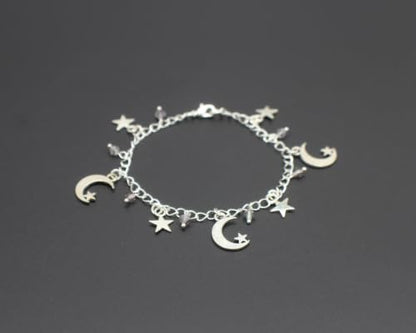 Handmade Moon and Star Charm Bracelet, Silver Plated Celestial Jewelry with Mauve Faceted Glass Beads, 7 Inch