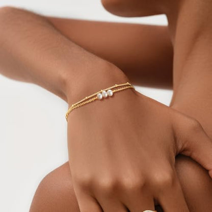 MEVECCO Dainty Chain Bracelets for Women, Layered and Charm Styles | 14K Gold Plated Brass, Select Cubic Zirconia Accents, Single and Multi-Row Structures for Refined Everyday Wristwear - style: 2 Layer 3 Pearls Satellite Chain