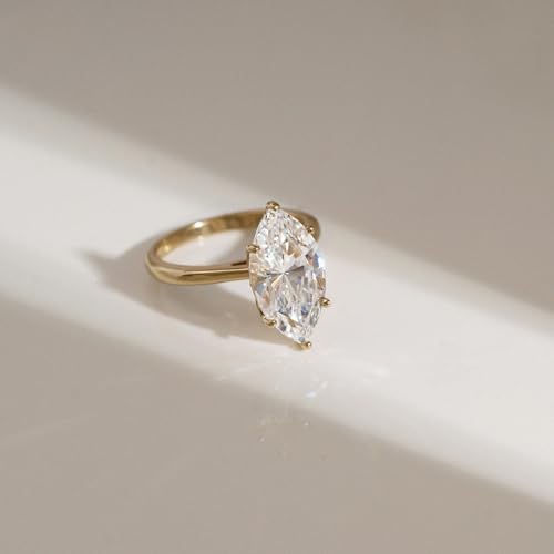 DIAMONBLISS Marilyn Monroe 10-Carat Big Solitaire Ring For Women | 14K Gold Plated 925 Sterling Silver Glamorous Cocktail Ring | 100 Facet Cubic Zirconia CZ Simulated Diamond - style: Marquise 5 Carats