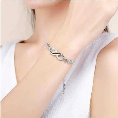 Nilu's Collection Infinity Shape Cubic Zirconia Diamond Bracelet for Women, Jewelry for Gift, Adjustable Charm Bracelet (Rose Gold Necklace + Bracelet) - color: Silver