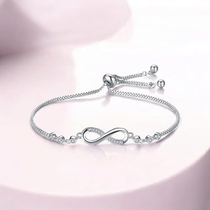 Nilu's Collection Infinity Shape Cubic Zirconia Diamond Bracelet for Women, Jewelry for Gift, Adjustable Charm Bracelet (Rose Gold Necklace + Bracelet) - color: Silver