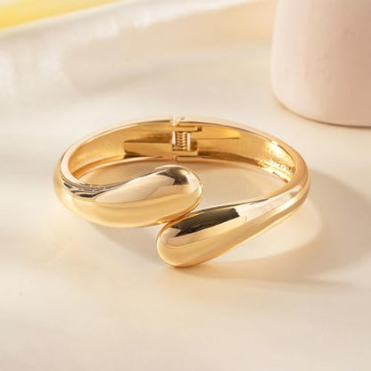 Gold Polished Chunky Twisted Hinged Waterdrop Bangle Bracelet Trendy Chunky Adjustable Gold Bangle for Women Spiraled Oval Bracelet