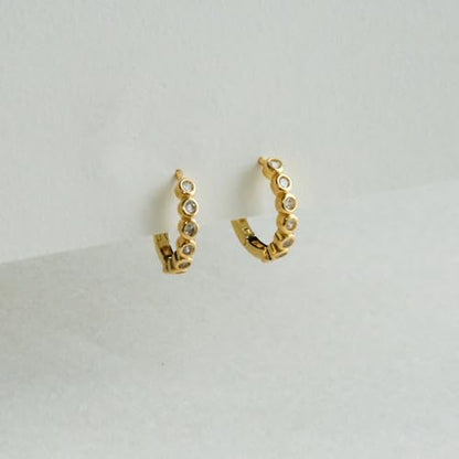 Round Huggie Ear Cuff Gold Earrings for Women | 18K Gold Plated Cubic Zirconia Sparkling | Clip On Cartilage| Simulated Diamond Bezel-Set CZ Huggie Hoop Earrings - color: Huggies - Yellow Gold