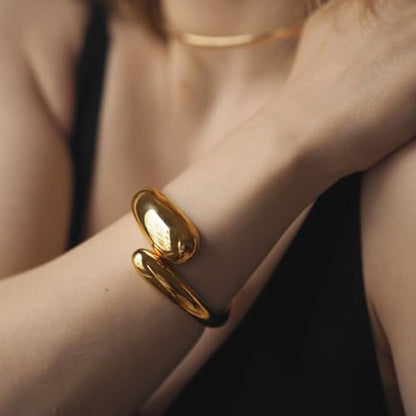 Golden Polished Chunky Twisted Hinged Waterdrop Bangle Bracelet for Women Spiraled Oval Bangle Bracelet - color: Golden Waterdrop Bangle