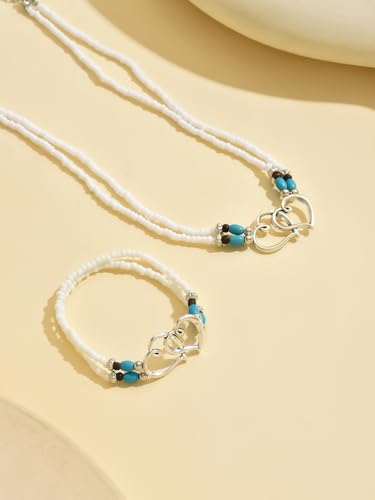Double Heart Beaded Necklace and Bracelet Set for Women - Boho Jewelry | Interlocked hollow pendant; vibrant turquoise accents; adjustable extender chain; secure lobster clasp; beach vibe