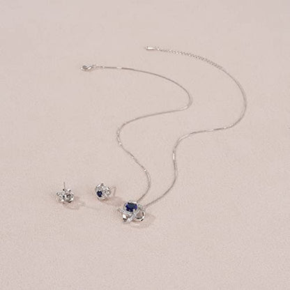 AMYJANE Bridal Jewelry Set for Women - Crystal Cubic Zirconia Love Knot Necklace Stud Earrings Elegant CZ Jewelry Set for Wedding Bride Bridesmaids Gift Set - color: Blue Sapphire(14k White Gold Plated)