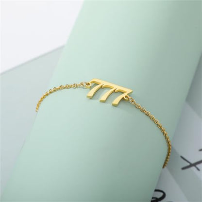 PAURO Women's Angel Number Bracelet Ankle Anklet Chain Adjustable | Stainless Steel, Minimalist Numerology Spiritual Statement Jewelry Gift - color: Gold 777, 5.5+2.8inch