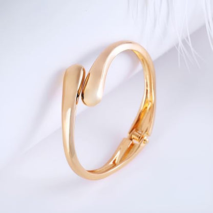 Golden Polished Chunky Twisted Hinged Waterdrop Bangle Bracelet for Women Spiraled Oval Bangle Bracelet - color: Gold Small Waterdrop Bangle