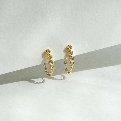 Round Huggie Ear Cuff Gold Earrings for Women | 18K Gold Plated Cubic Zirconia Sparkling | Clip On Cartilage| Simulated Diamond Bezel-Set CZ Huggie Hoop Earrings - color: Drop Chain - Yellow Gold