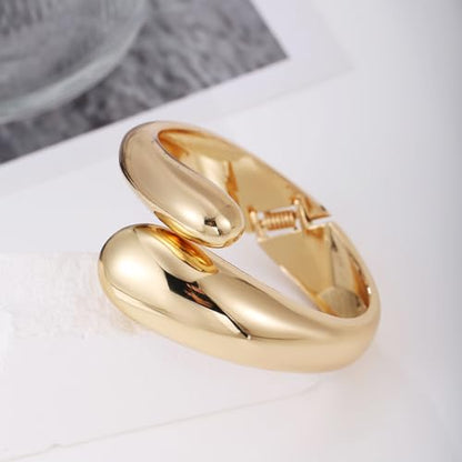 Golden Polished Chunky Twisted Hinged Waterdrop Bangle Bracelet for Women Spiraled Oval Bangle Bracelet - color: Golden Waterdrop Bangle