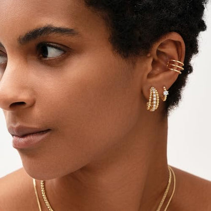 MEVECCO Chunky Huggie Hoop Earrings for Women Starburst Beaded Styles | 18K Gold Plated Brass, Triple Or Single Cubic Zirconia Star Details, Graduated Rounded Profile, Front Stone Row - style: Slit Bead