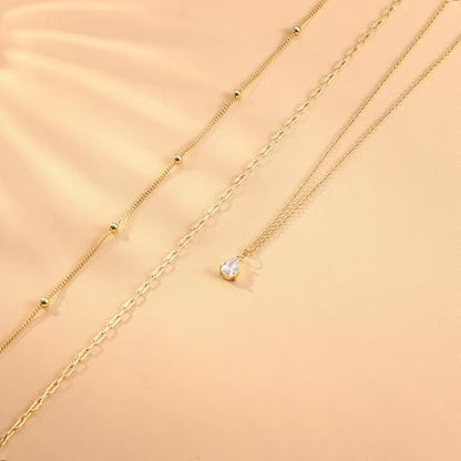 Kakonia Layered Gold Necklaces for Women, 3-Piece Gold Necklace Stack | 14K gold plated pendant necklace set, 3 dainty gold chains, trendy jewelry for women, ideal for weddings, proms or gifting - style: Teardrop-shape CZ Pendant