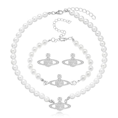 Dreuyet Saturn Pearl Necklace and Earrings Set Crystal Planet Earrings Dainty Artificial Pearl Choker Necklace Charm Gifts for Mum Wife Wedding Birthday Anniversary - color: Saturn Earrings Necklace Bracelet Silver