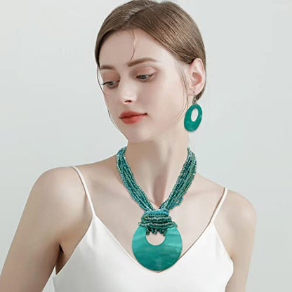 Coiris Multi Strand Statement Colorful Beaded Necklace with Big Circle Shell Pendant for Women - color: Teal-