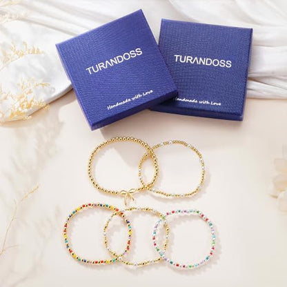 Turandoss 5PCS 14K Gold Plated Beaded Stretch Bracelets Set for Women | Stacked Bow Cross Wave Knot Pearl Beads Bracelet Set, Waterproof 7 Inch Stretch Elastic, Summer Jewelry Gifts for Women Girls - color: 5PCS Bow Beaded Bracelets