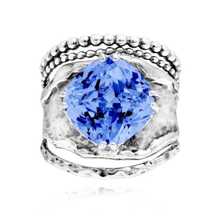 JEAN RACHEL JEWELRY 925 Sterling Silver Prong Solitaire Ring | Raised crown engagement style ring mounting a precision faceted brilliant Cubic Zirconia solitaire over stacked silver rows. - color: Tanzanite CZ