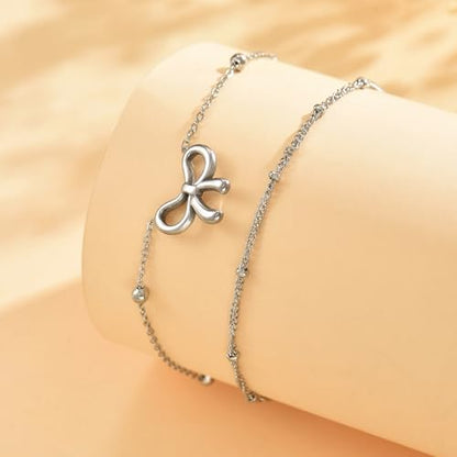 NONAMOIS 18K Gold Plated Diamond Ankle Bracelets for Women Waterproof Gold CZ Pearl Bow Link Chain Anklets Non Tarnish Summer Beach Foot Jewelry Gifts - color: Layered Satellite Bow-White Gold