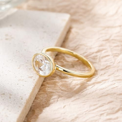 EAMTI 3CT Engagement Rings for Women Oval Cut CZ Solitaire Promise Wedding Bands Travel Bezel East West Ring 14K Gold Plated Size 4-10 - color: Brass-Gold
