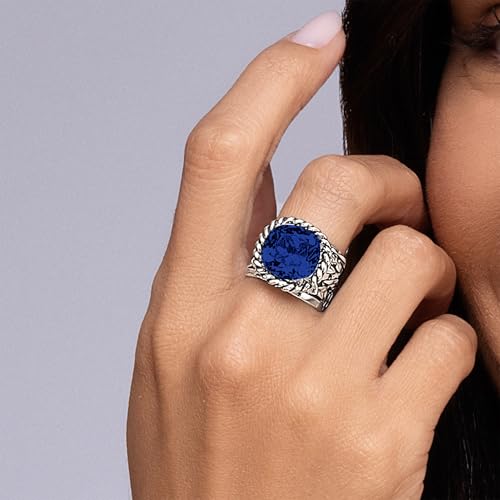 JEAN RACHEL JEWELRY 925 Sterling Silver Braid Leaf Cushion Ring | Ornate statement ring beautifully adorned with sculpted leaf motifs, twisted rope braids, and a CZ center stone. - color: Sapphire CZ