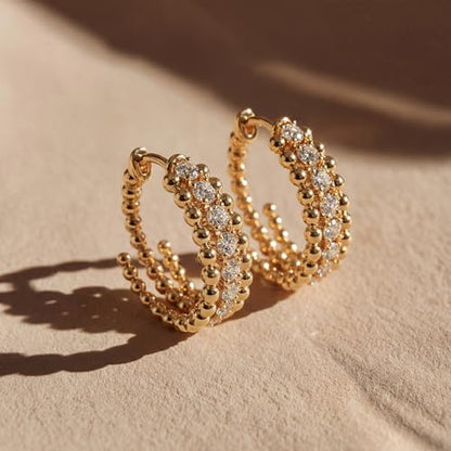 MEVECCO Chunky Huggie Hoop Earrings for Women Starburst Beaded Styles | 18K Gold Plated Brass, Triple Or Single Cubic Zirconia Star Details, Graduated Rounded Profile, Front Stone Row - style: Slit Bead