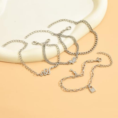 4 Pcs Layered Silver Tone Anklets for Women Trendy Butterfly Snake Lock Key Charms Ankle Bracelets Set Adjustable Summer Beach Vacation Foot Jewelry