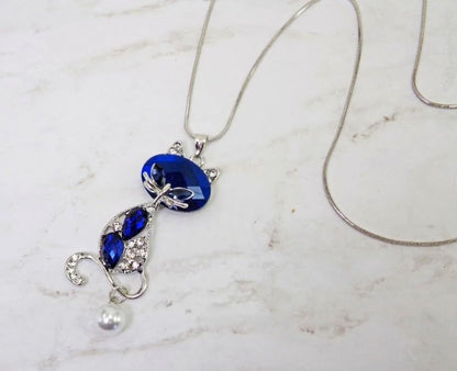 Blue Crystal Cat Pendant Necklace for Women – Large Sparkling Rhinestone with Moving Pearl, Long Silver Tone Snake Chain, Cat Lover Gift Fashion Statement Jewelry