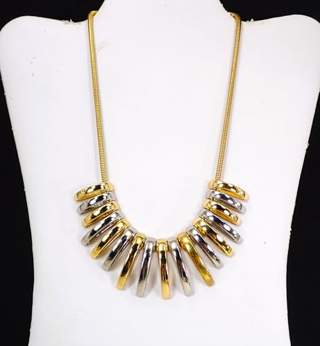 Silver and gold necklace designed with dome shape metal links attached to a snake chain. Two tone fashion necklace.