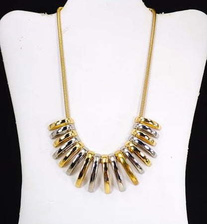 Silver and gold necklace designed with dome shape metal links attached to a snake chain. Two tone fashion necklace.