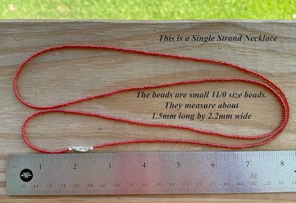 Kathy Bankston Red Seed Bead Necklace, Thin 1.5mm Single Strand Beaded Necklace - color: Shiny Siam Red