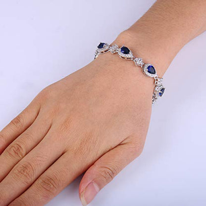 EleQueen Women's Silver-Tone Cubic Zirconia Teardrop Flower Bridal V-Necklace Sets Tennis Bracelet Dangle Earrings for Wedding Bridesmaids - color: Sapphire Color
