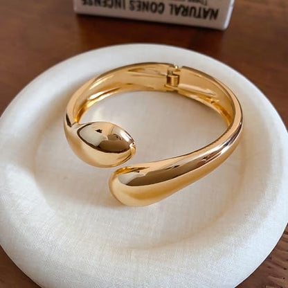 Gold Polished Chunky Twisted Hinged Waterdrop Bangle Bracelet Trendy Chunky Adjustable Gold Bangle for Women Spiraled Oval Bracelet