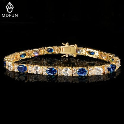 MDFUN 18K White/Yellow Gold Plated Green/Blue 5 * 7MM Oval 5A+ Cubic Zirconia Tennis Bracelet for Women Birthstone Jewelry Gift 6.5-8.5 inch - color: 18K Yellow Gold -Blue