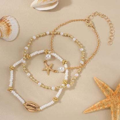 Qceasiy Starfish Ankle Bracelets for Women, Boho Beaded Beach Anklets Set | Gold-plated layered anklets in seashell, disc, and conch styles, with stretch or adjustable fits for summer beach outfits. - color: Gold Plated White