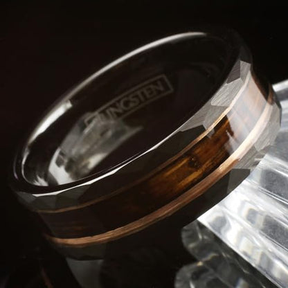 Gorgeous Unique 8mm Brushed Satin Finish Black Tungsten Carbide Faceted Flat Band Ring with Charred Whiskey Barrel Oak Wood Inlay between Rose Gold Stripes.
