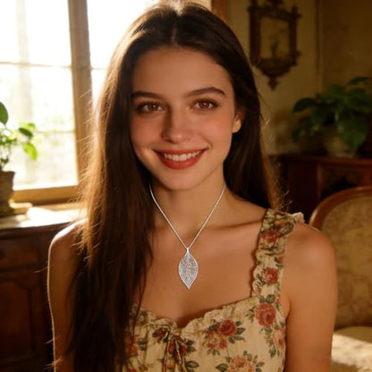 NLCAC Filigree Leaf Pedant Necklace Snake Chain Gorgeous Hollow Leaf Necklace for Women - color: Silver Tone