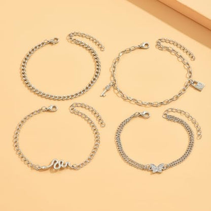 4 Pcs Layered Silver Tone Anklets for Women Trendy Butterfly Snake Lock Key Charms Ankle Bracelets Set Adjustable Summer Beach Vacation Foot Jewelry