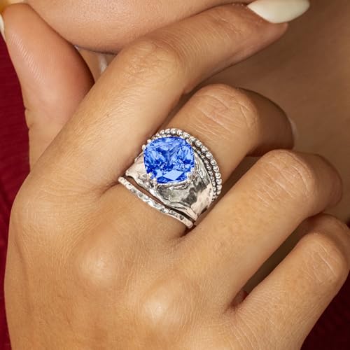 JEAN RACHEL JEWELRY 925 Sterling Silver Prong Solitaire Ring | Raised crown engagement style ring mounting a precision faceted brilliant Cubic Zirconia solitaire over stacked silver rows. - color: Tanzanite CZ