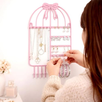 Novabright Pink Bow Wall Hanging Jewelry Organizer with 16 Hooks 48 Stud Holes 15.75inch Pink Metal Wall Necklace Holder Cute Coquettish Jewelry Hanger Rack for Bracelets Earrings Girls Room Decor