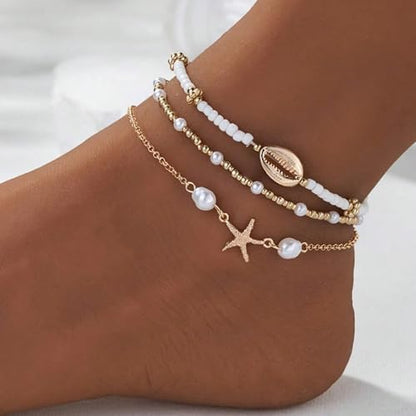 Qceasiy Starfish Ankle Bracelets for Women, Boho Beaded Beach Anklets Set | Gold-plated layered anklets in seashell, disc, and conch styles, with stretch or adjustable fits for summer beach outfits. - color: Gold Plated White