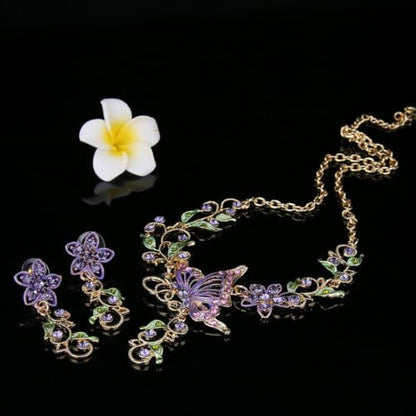 EleQueen Women's Crystal Butterfly Flower Leaf Necklace Earrings Set | Crystal Jewelry Set for Brides Bridesmaids, Necklace Set for Party - color: Gold-Tone Purple