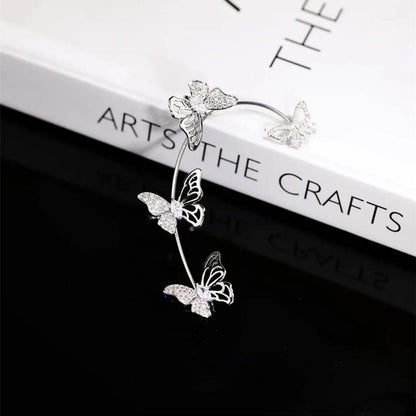 BETHYNAS Glitter Rhinestone Butterfly Flower Ear Cuff Sparkly Non-Pierced Crystal Tassel Fake Earrings Climber Lady Ear Wrap Bridal Party Ear Jewelry for Women and Girls - color: Silver Hollow Butterfly