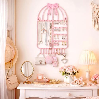 Novabright Pink Bow Wall Hanging Jewelry Organizer with 16 Hooks 48 Stud Holes 15.75inch Pink Metal Wall Necklace Holder Cute Coquettish Jewelry Hanger Rack for Bracelets Earrings Girls Room Decor