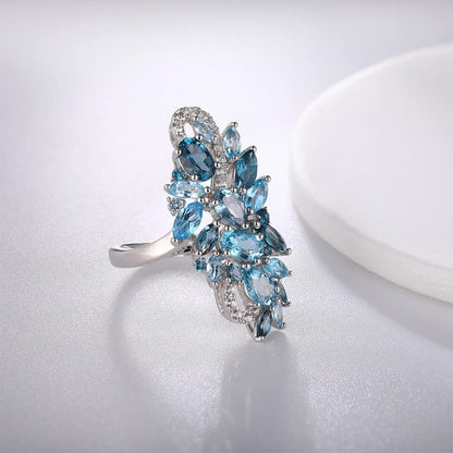 Statement Flower Ring Cocktail Leaf Ring Birthstone Anniversary Signet Ring | Hypoallergenic|14K Gold Plated|Sterling Silver Sparkling Engagement Promise Party Ring for Women, Size 6 to 10(With Box) - color: Long Leaf -London Blue Topaz