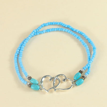 Elastic Beaded Ankle Bracelets for Women Double Heart Layered Stretch Ankle Bracelets Waterproof Dainty Boho Beaded Anklets for Summer Beach Foot Jewelry - color: Blue Silver
