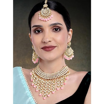 Aheli Elegant Indian Wedding Wear Faux Kundan Studded Choker Necklace with Maang Tikka Set Ethnic Fashion Jewelry for Women Maroon Kundan & Pearl Drop - color: Pink