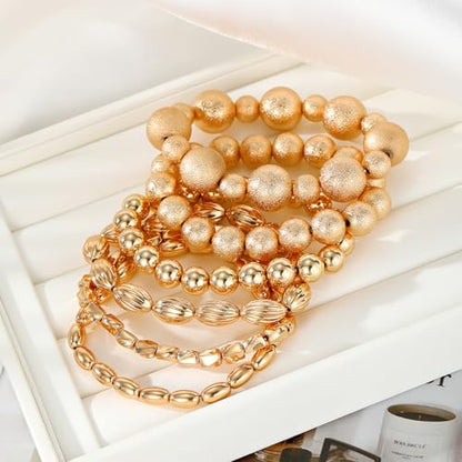 KISS WIFE Gold Beaded Bracelets for Women, Stackable Stretch Bracelet Set | 13 stretch bracelets combine polished gold-tone beads and faux pearls for stacked or individual everyday styling. - color: Gold Matte