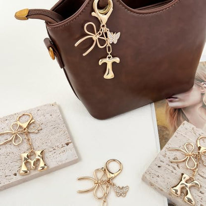 Gold Bubble Heart, Cherry, Bow & More Designs Letter Initial Keychain Bag Charms – Cute Purse Charms for Handbags - color: Bow & Butterfly, style: T