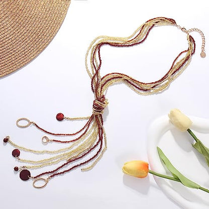 Coiris Long Seed Beaded Multi Strand Necklace,10 Multiple Statement Long Bib Necklace with Tie Knot for Women and Girls Jewelry - color: Brown